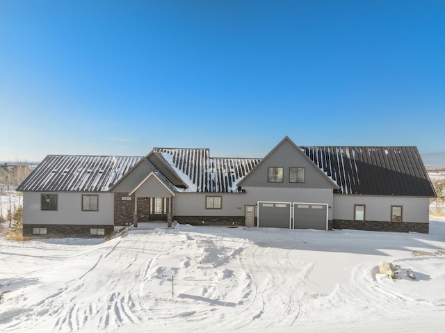 view of snow covered property