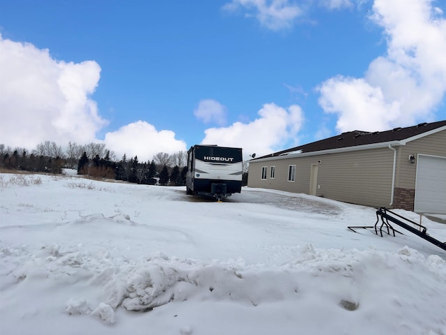 view of snowy yard