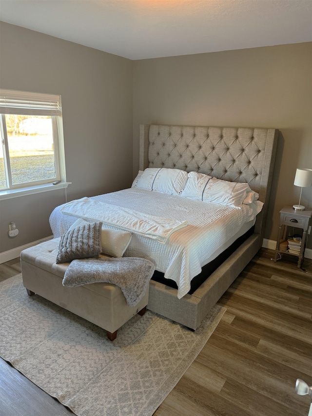 bedroom featuring hardwood / wood-style flooring