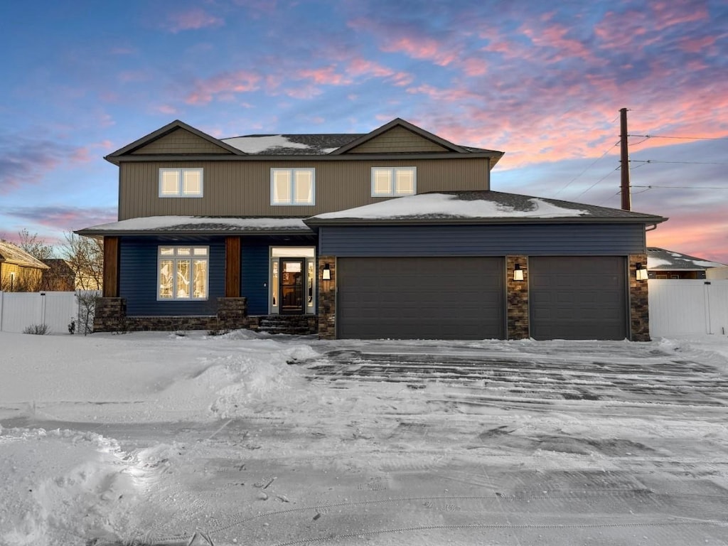 view of front of property featuring a garage