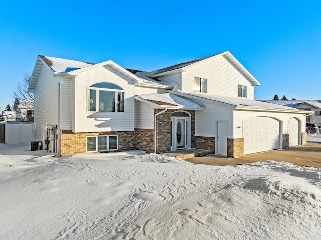 view of front of property featuring a garage