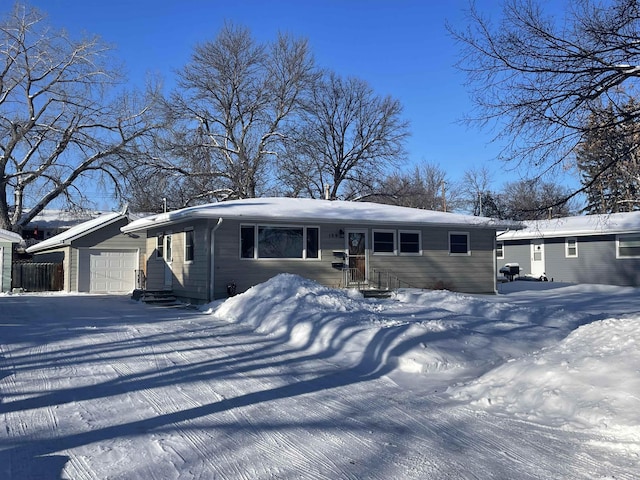 single story home featuring a garage