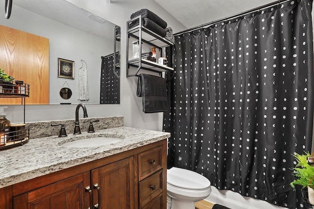 bathroom featuring sink and toilet