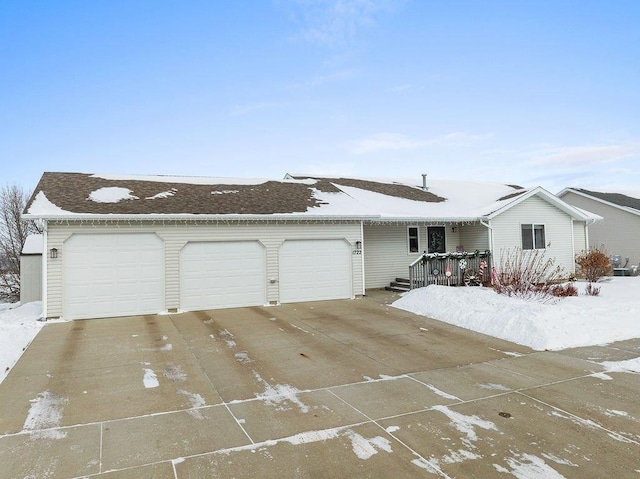 single story home featuring a garage