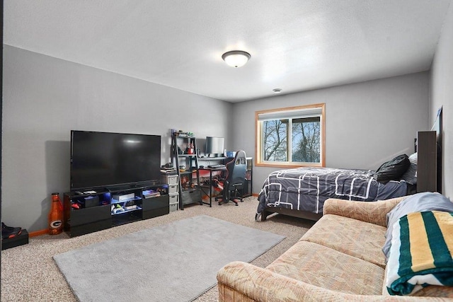 bedroom featuring light colored carpet