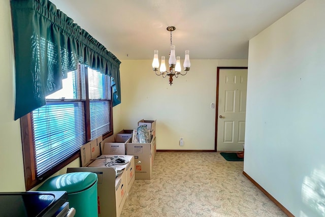 interior space with a chandelier