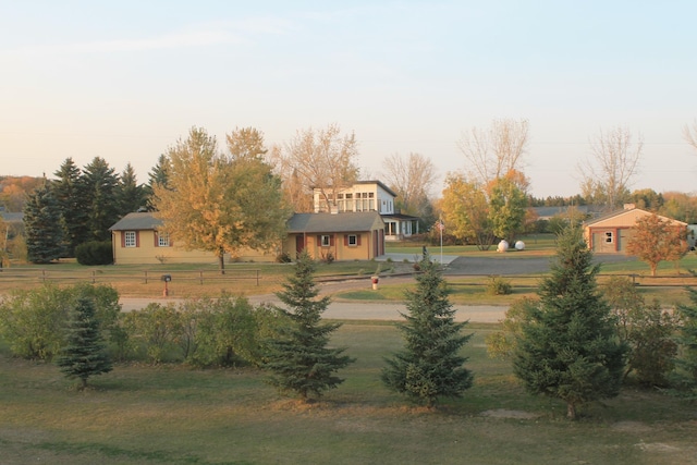 view of yard at dusk