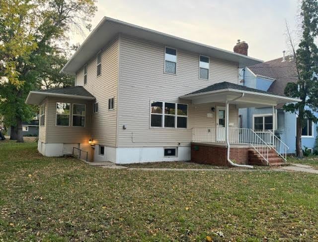 view of front of home with a front yard