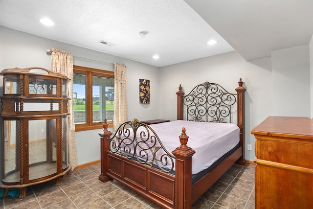 529 Rice Lake Rd, Rice Lake, ND 58735 - bedroom featuring a textured ceiling