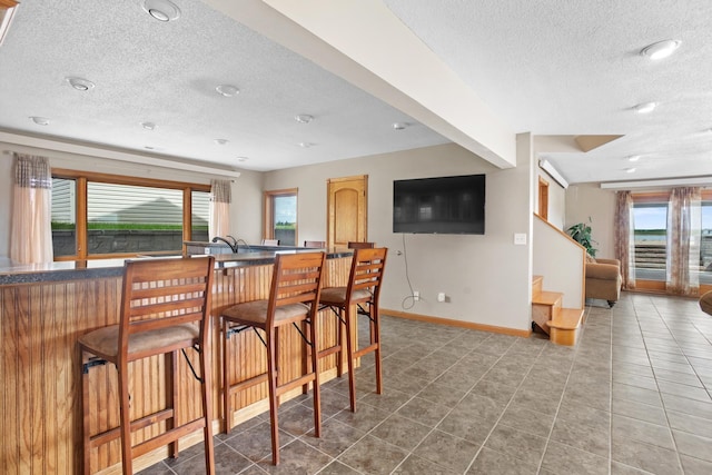 529 Rice Lake Rd, Rice Lake, ND 58735 - kitchen with a kitchen breakfast bar