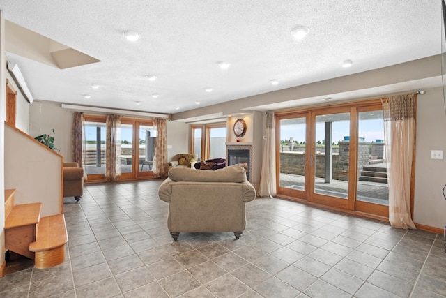 529 Rice Lake Rd, Rice Lake, ND 58735 - tiled living room with a textured ceiling