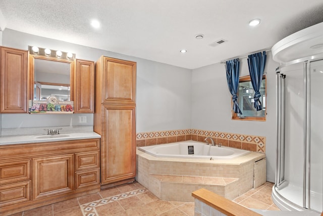 529 Rice Lake Rd, Rice Lake, ND 58735 - bathroom featuring vanity, tile patterned floors, and shower with separate bathtub