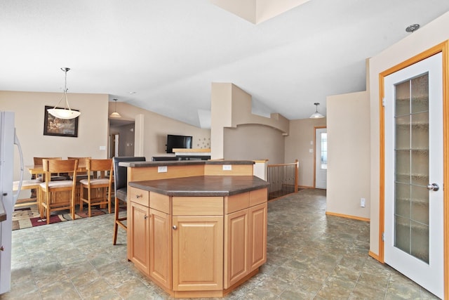 529 Rice Lake Rd, Rice Lake, ND 58735 - kitchen with decorative light fixtures, a kitchen island, and lofted ceiling
