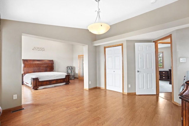 529 Rice Lake Rd, Rice Lake, ND 58735 - bedroom with a closet and wood-type flooring