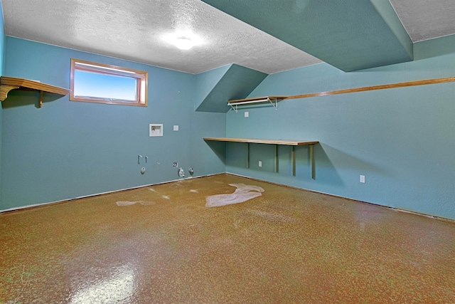 interior space with a textured ceiling