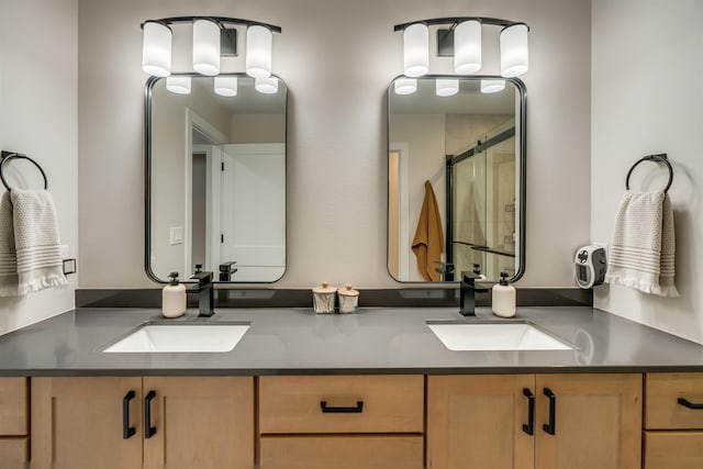 bathroom with vanity and walk in shower