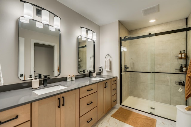 bathroom with vanity and walk in shower