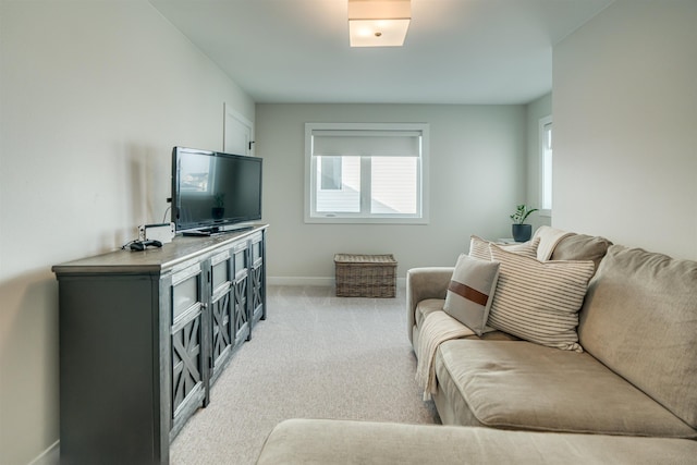 living room featuring light carpet