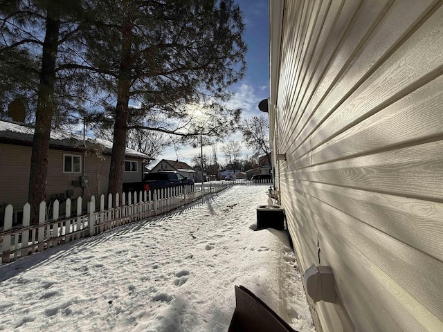 view of snow covered property