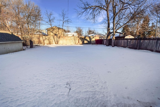 view of yard covered in snow