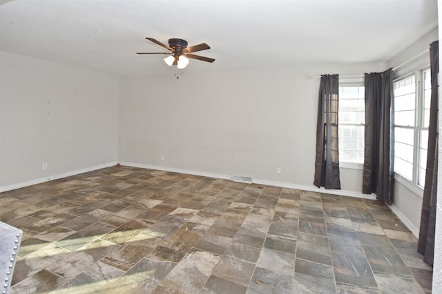 spare room featuring ceiling fan