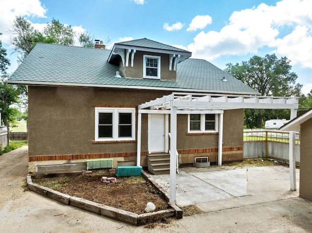 back of property featuring a patio area