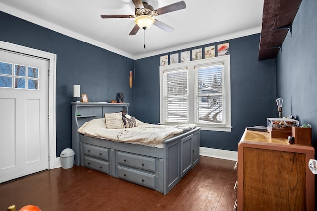 bedroom featuring dark wood-type flooring and ceiling fan