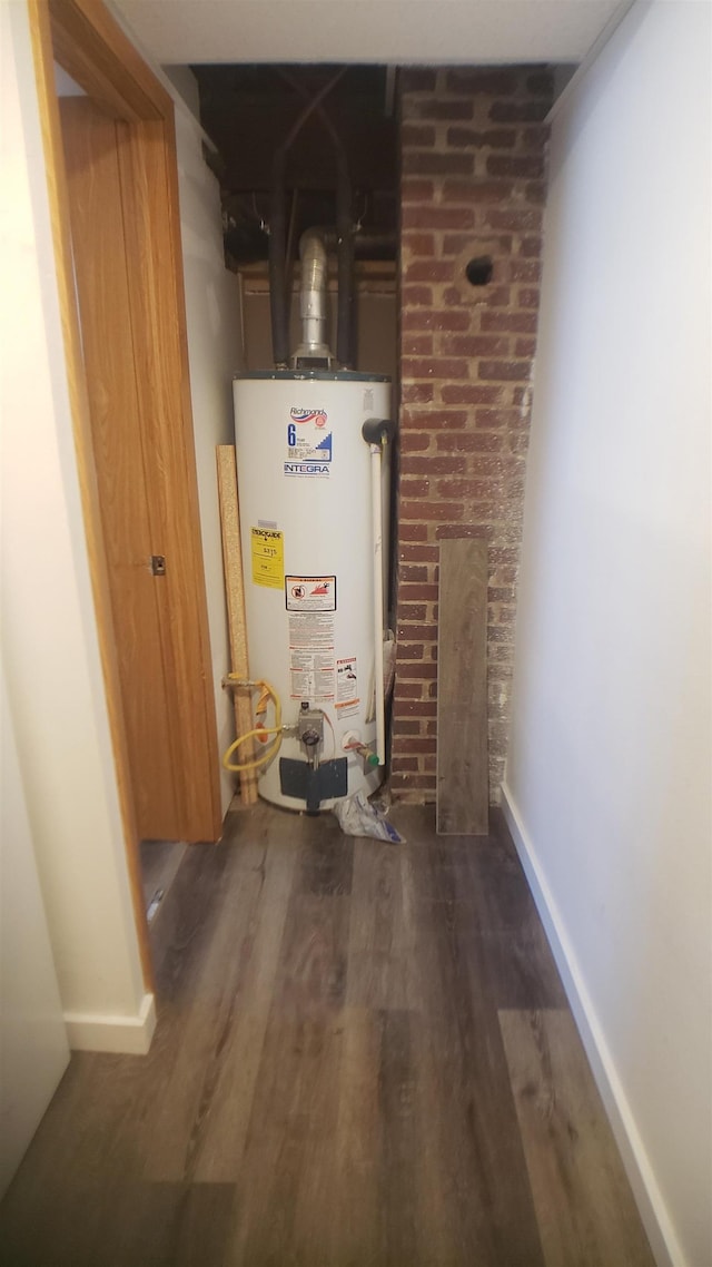 utility room featuring gas water heater