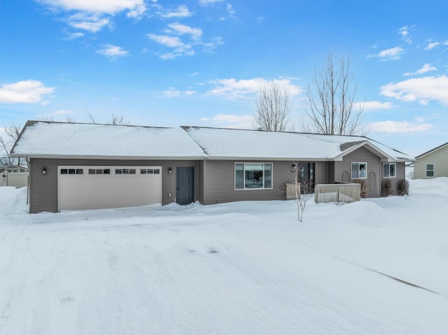 single story home with a garage