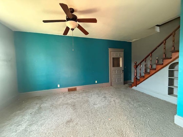 unfurnished living room with ceiling fan