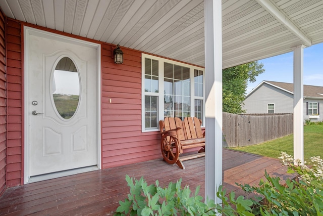 entrance to property featuring covered porch