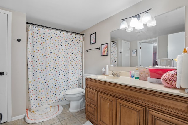 bathroom with tile patterned flooring, vanity, a shower with shower curtain, and toilet