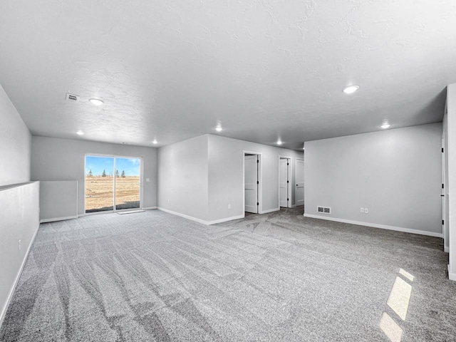 interior space with a textured ceiling