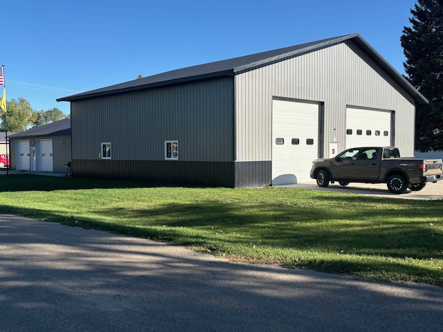 garage with a yard