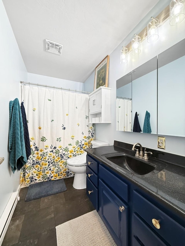 bathroom featuring vanity, toilet, and a baseboard radiator