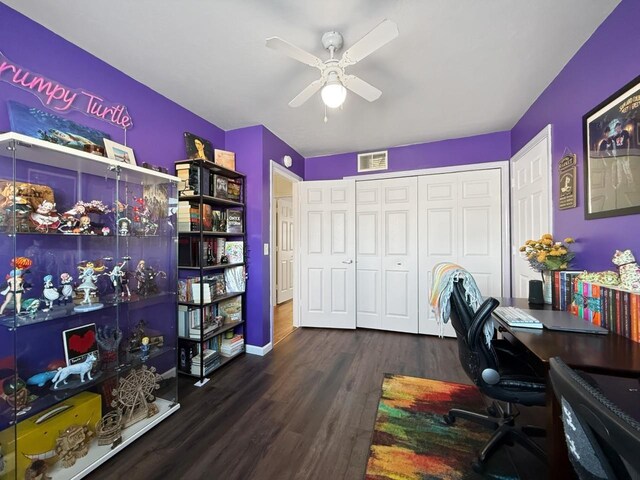 office area with dark hardwood / wood-style flooring and ceiling fan