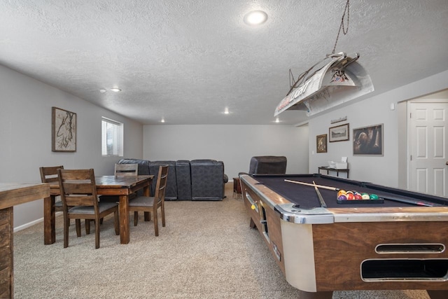 recreation room featuring light carpet, billiards, and a textured ceiling