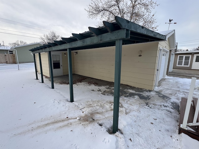 view of snow covered patio