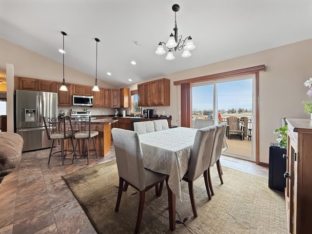 dining area with recessed lighting, vaulted ceiling, and an inviting chandelier