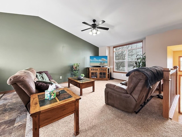 living room featuring carpet, vaulted ceiling, and a ceiling fan