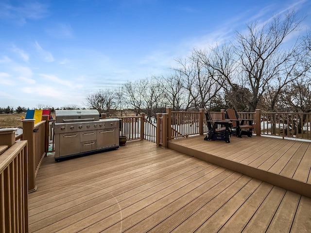 wooden deck with grilling area