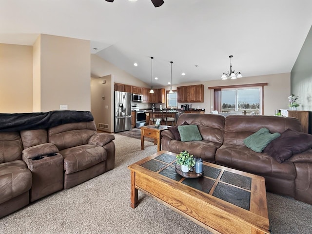 living room featuring lofted ceiling, recessed lighting, light carpet, ceiling fan with notable chandelier, and visible vents