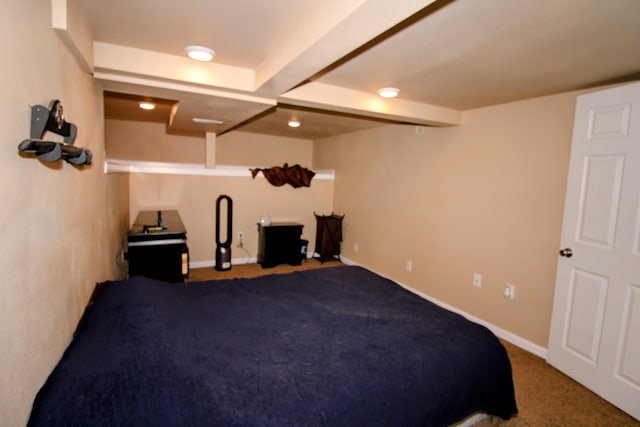 bedroom featuring carpet and baseboards