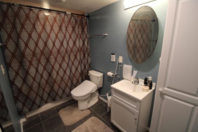 bathroom featuring toilet, tile patterned floors, curtained shower, and vanity