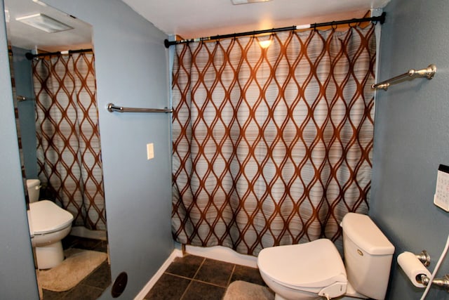 full bath featuring curtained shower, tile patterned flooring, and toilet