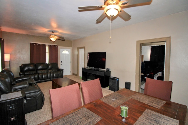 living room featuring a ceiling fan