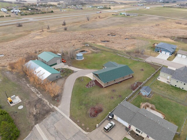 birds eye view of property featuring a rural view