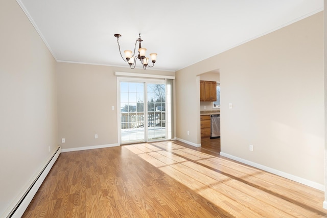 interior space featuring baseboards, crown molding, light wood-type flooring, a baseboard heating unit, and a notable chandelier