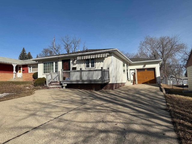 ranch-style home with an attached garage and driveway