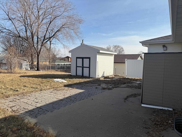 view of shed with fence